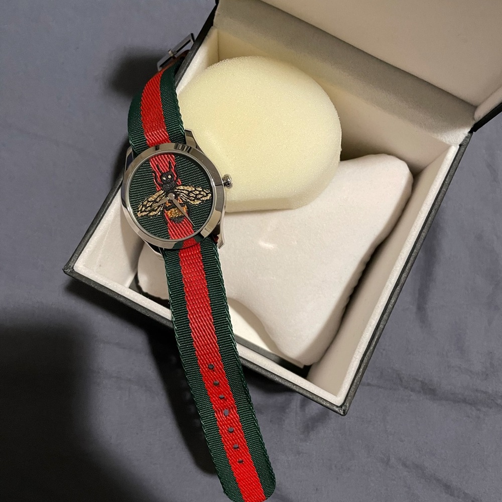 Gucci wristwatch, gently worm, comes in a box, selling it because I got a Rolex.